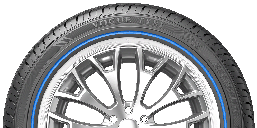 Showing the Vogue Tyre White/Blue Sidewall